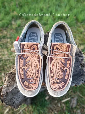 Men's size 10 loafers with custom tooled leather patches