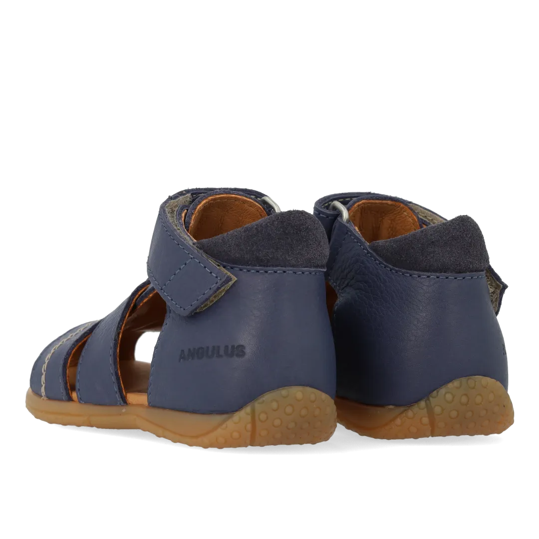 The child's first sandal with contrast stitching